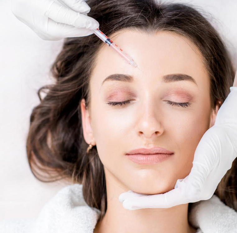 woman receiving aesthetic injections