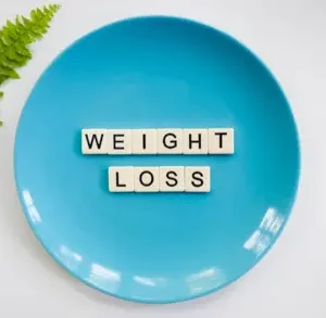 blue plate with weight loss written on it