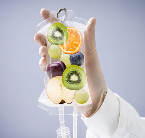 Myers’ infusion IV therapy bag with vitamins and fruit representing hydration and wellness treatment