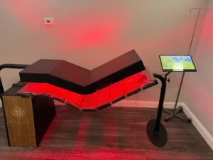 Dahlia full-body red light therapy bed at Vitality IV featuring medical-grade LED light therapy for cellular rejuvenation, skin tightening, and muscle recovery